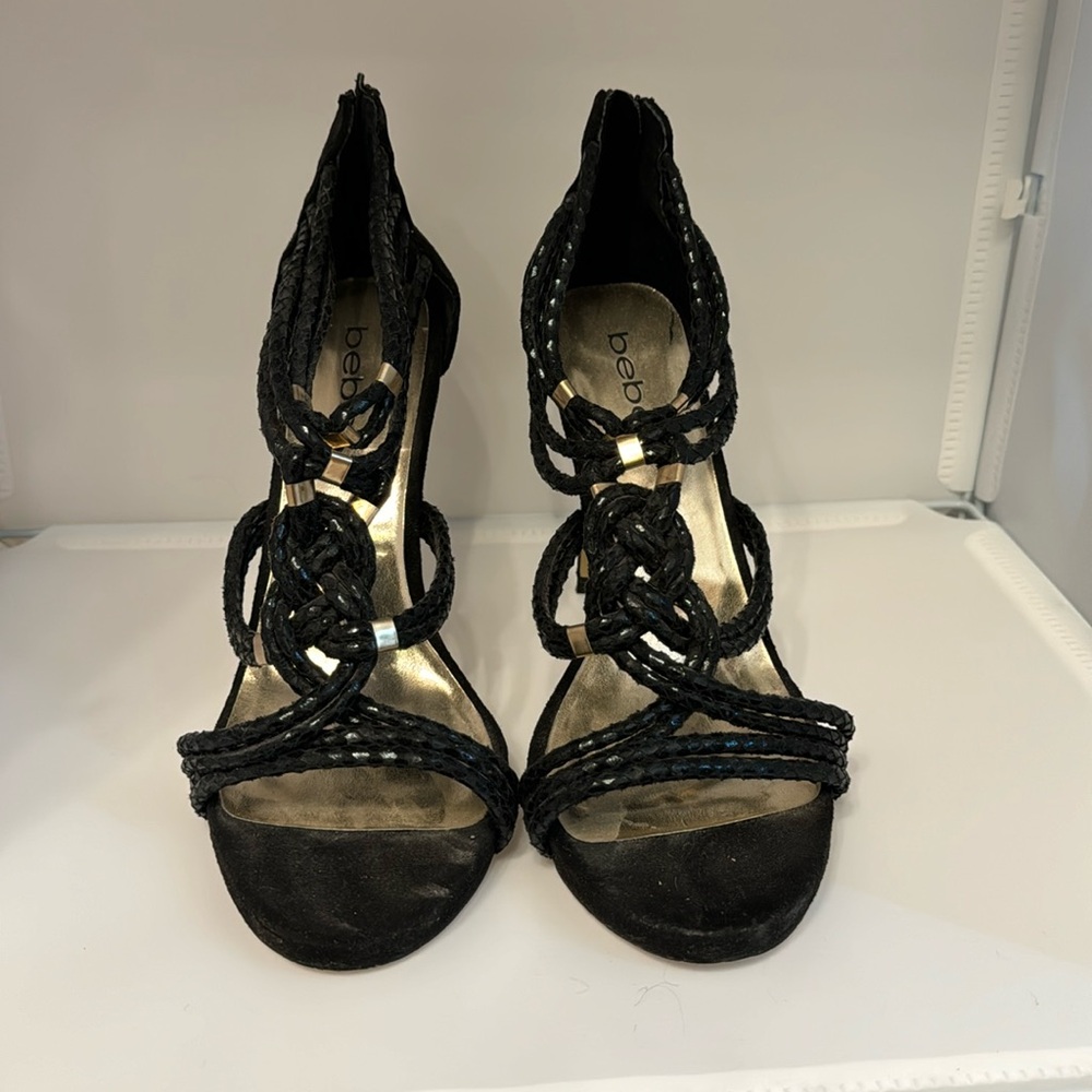 Gently used Bebe black heels. Size 8